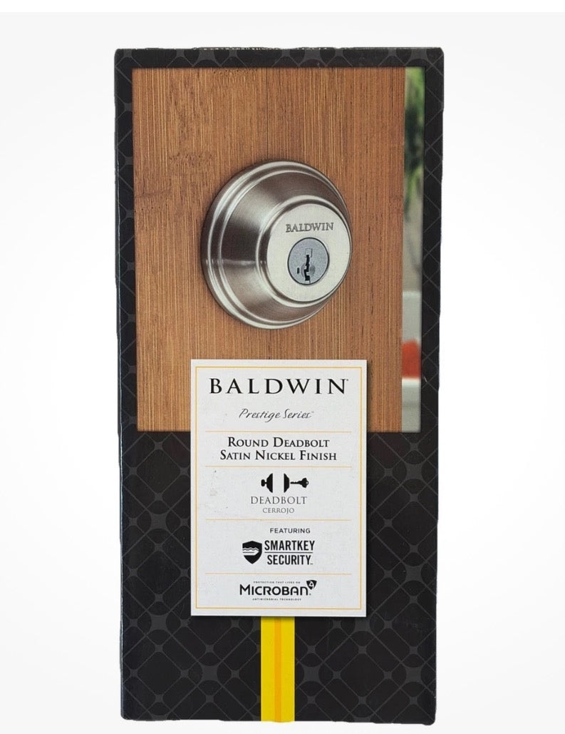 Baldwin Prestige Series Round Deadbolt in a satin nickel finish, featuring a modern, rounded design 3-B